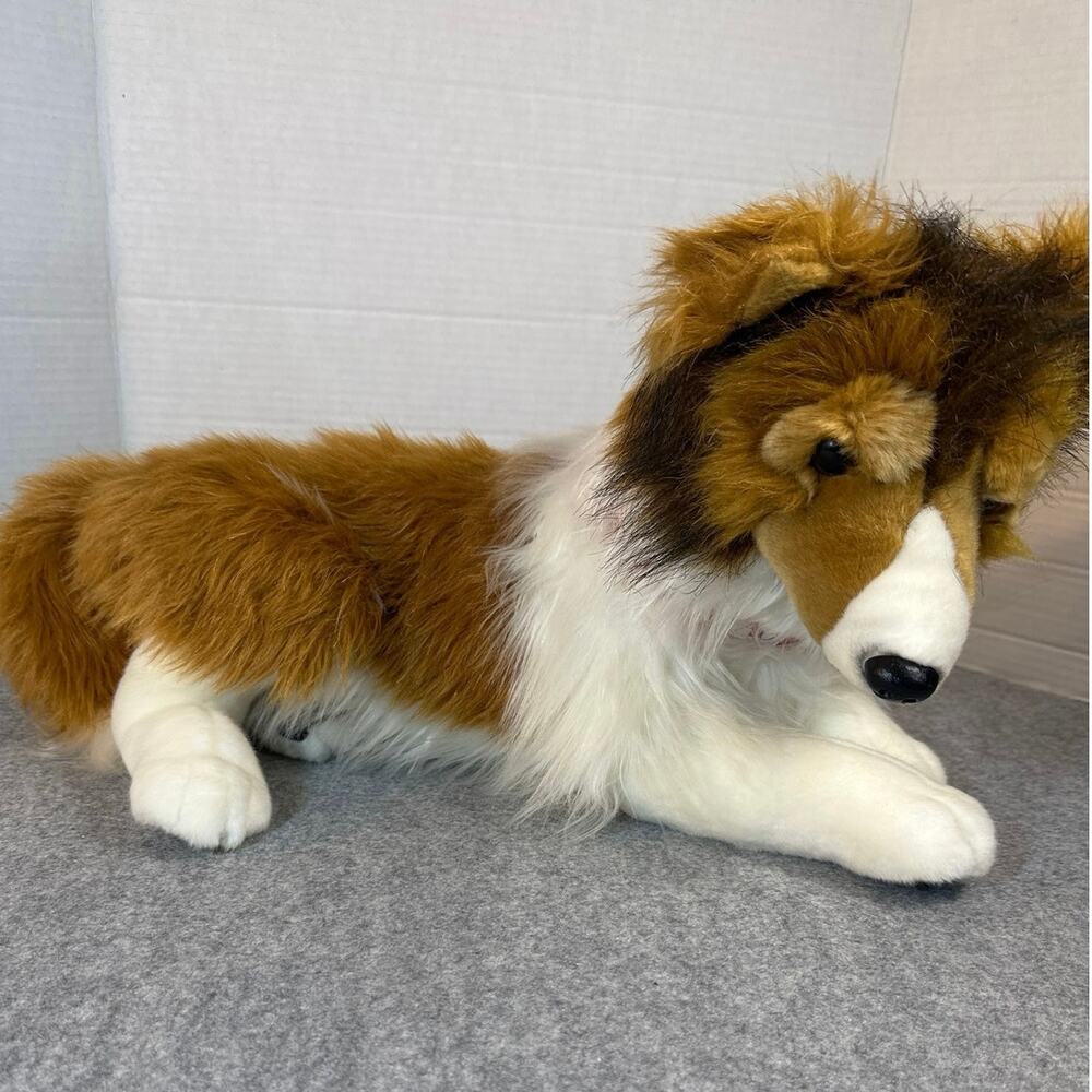 FAO Schwarz Rough Collie plush stuffed animal designed "laying down" pose. 19”